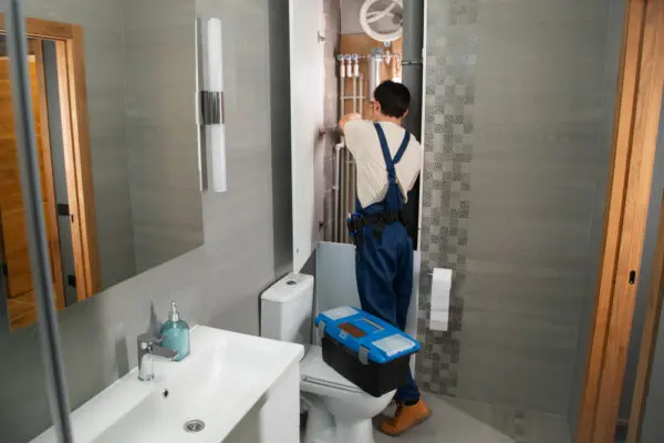 Bathroom Renovation Wolverhampton with elegant wall tiles, walk-in shower, and modern fittings.